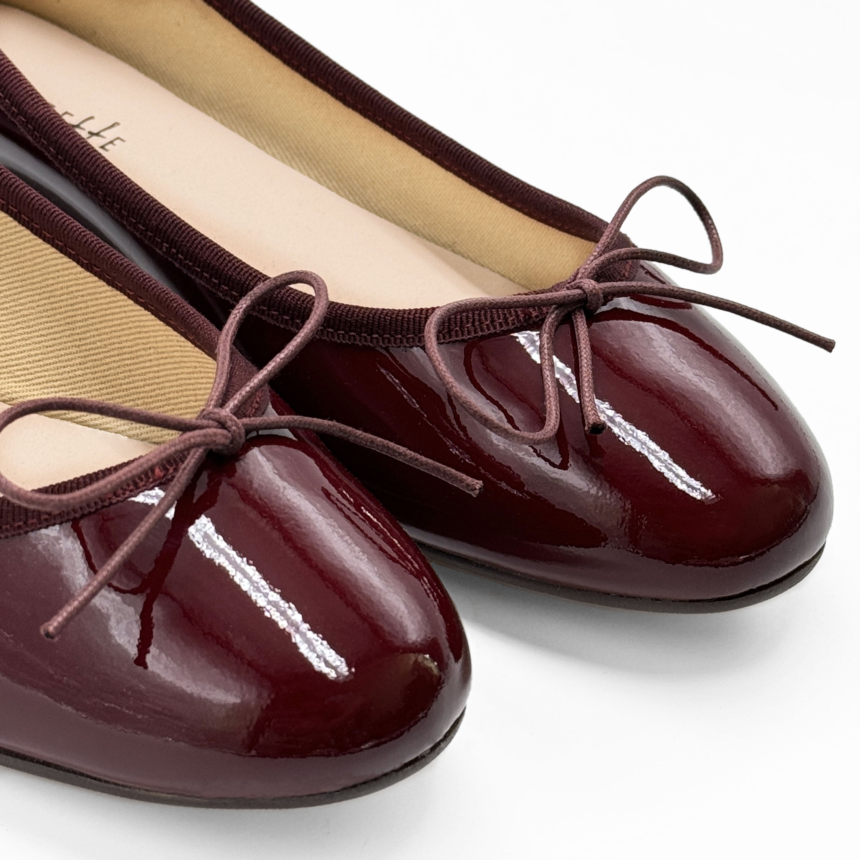 Burgundy patent leather ballet flats