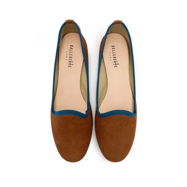 Brown suede loafers and dark blue details