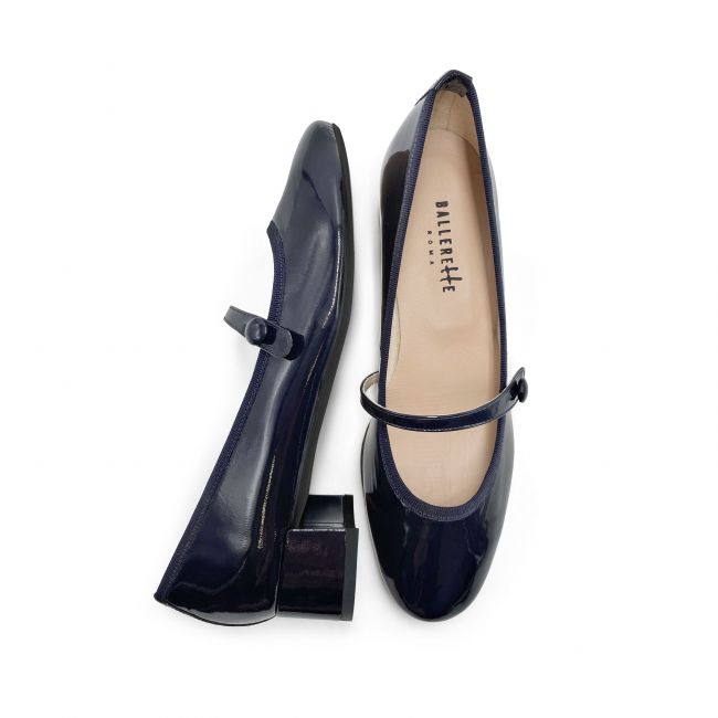 Blue patent leather ballet flats with strap and heel