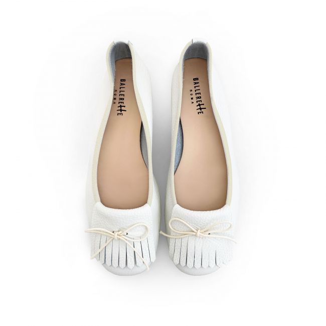 White leather loafers with fringe tassel