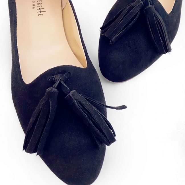Navy blue suede moccasins with tassels